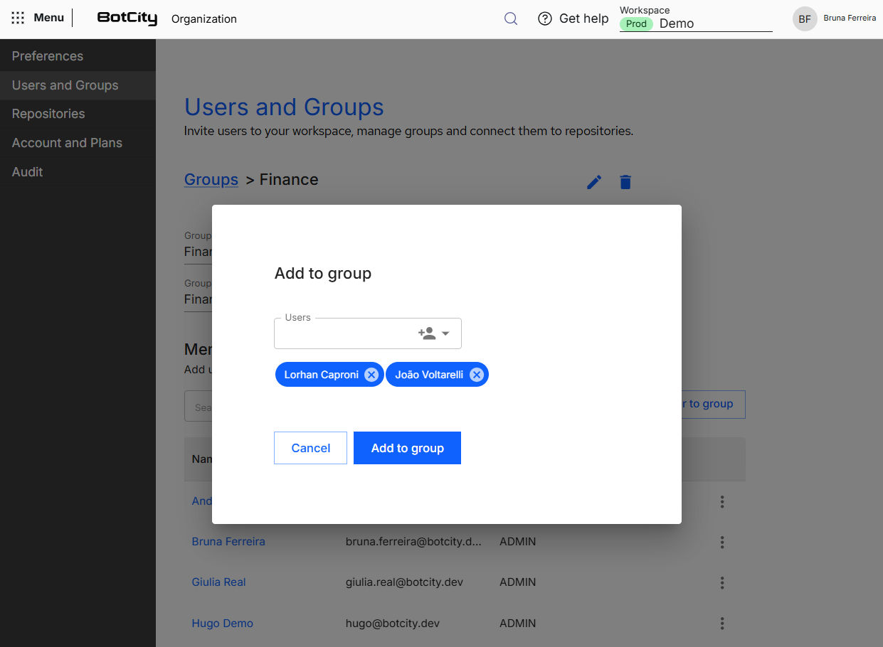 Screenshot of the BotCity Orchestrator, on the information screen of the Finance group, with the "Add to group" form open, showing the Users field, two users already selected as tags and the Cancel and Add to group buttons.